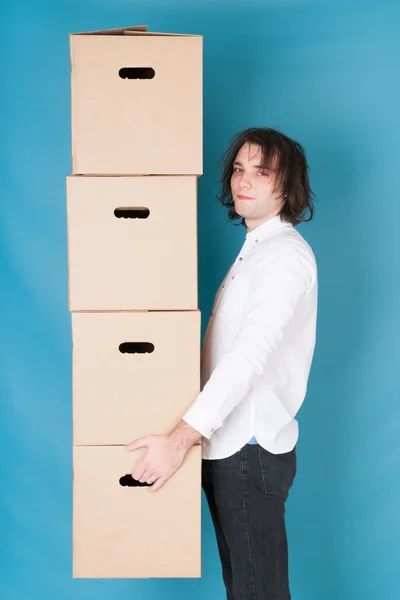 Homem em movimento com caixas — Fotografia de Stock