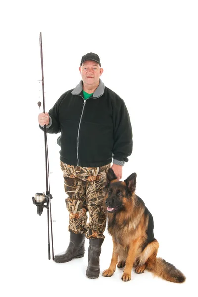 Pescador com cana de pesca e cão — Fotografia de Stock