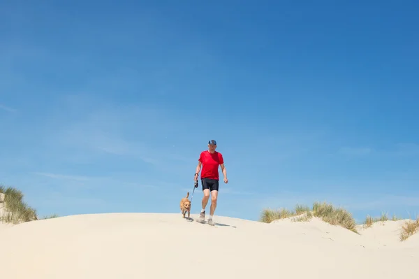 Running with dog in nature — Stock Photo, Image