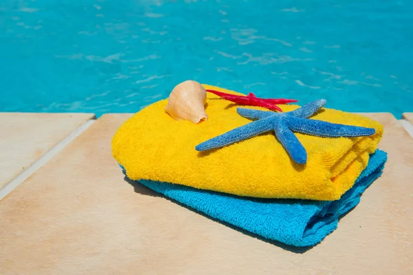 Towels at the swimming pool — Stok fotoğraf
