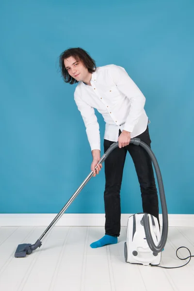 Man with vacuum cleaner — Stock Photo, Image