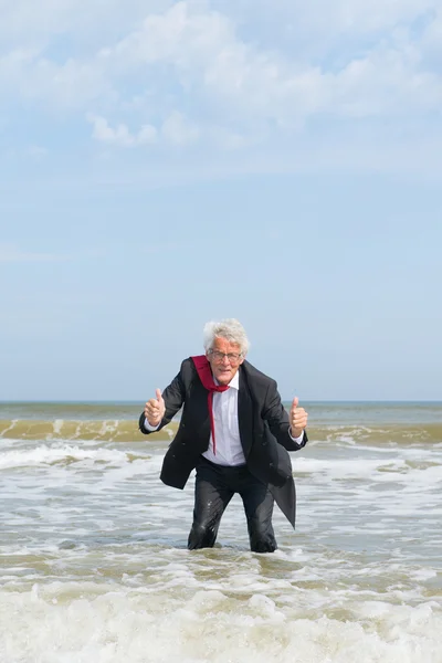 Senior business man in water — Stock Photo, Image