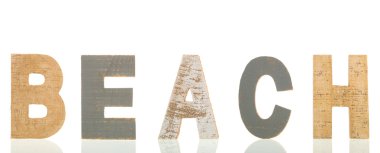 wooden text beach