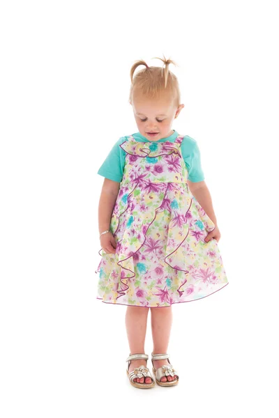 Shy toddler girl in summer dress — Stock Photo, Image