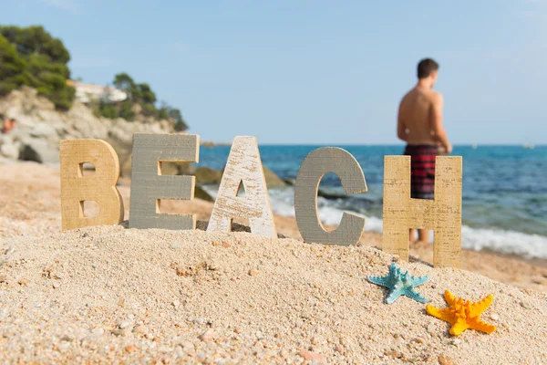 Letras vintage na praia — Fotografia de Stock