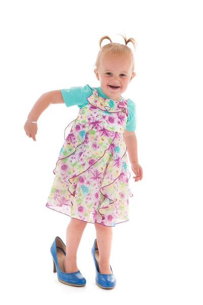 Toddler girl in mothers big shoes — Stock Photo, Image