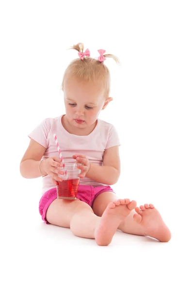 Toddler girl drinking lemonade — Stock Photo, Image