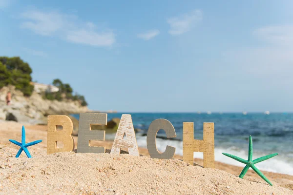 Letras vintage na praia — Fotografia de Stock