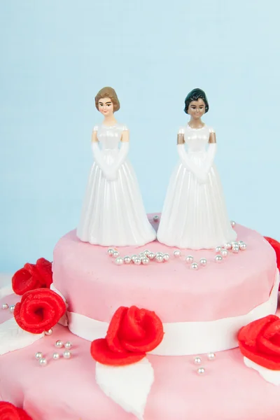 Wedding cake with lesbian couple — Stock Photo, Image