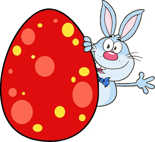 Rabbit Waving Behind Easter Egg. — Stock Vector