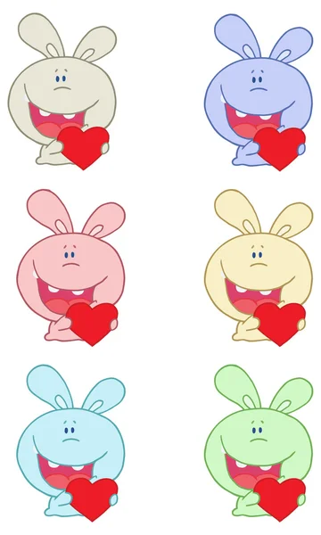 Cartoon kaniner med hjärtan — Stock vektor