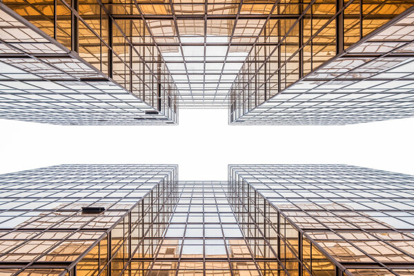 Golden office building in Hong Kong, looking up in between