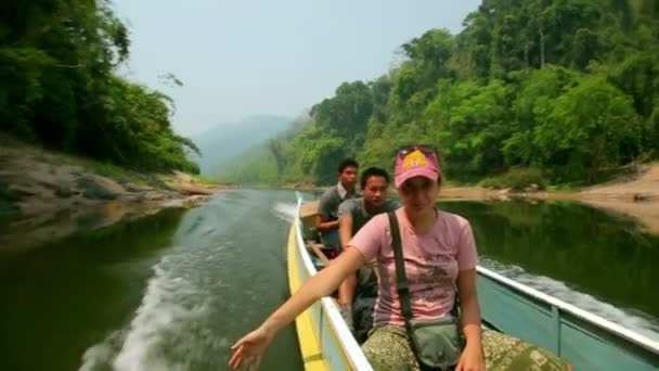 Boat trip tourist woman and local people — Stock Video