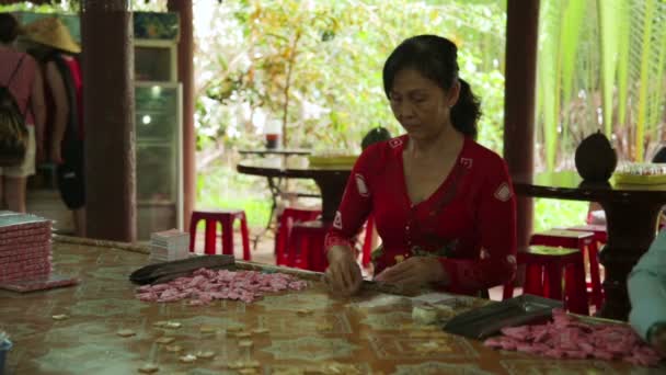 Coconut candy makers — Stock Video