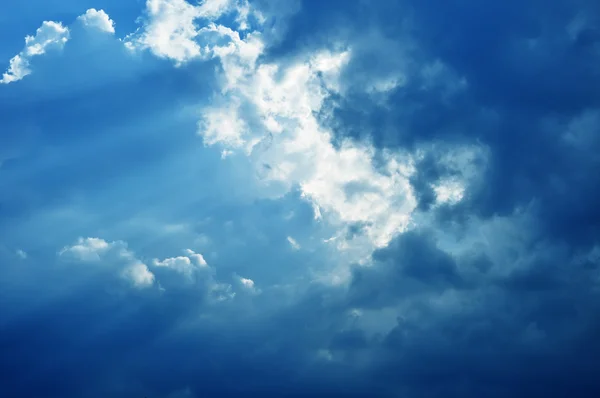 Light beams in blue sky — Stock Photo, Image