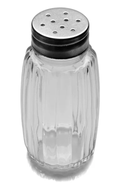 Empty glass salt shacker on white — Stock Photo, Image