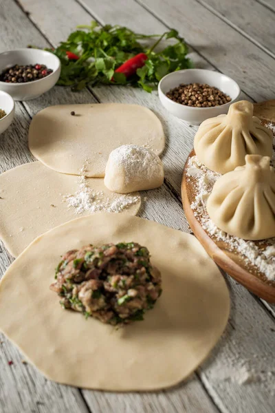 Close Caucasian Khinkali Dumplings Dish Served Plate Background Ingredients Scattered — Stockfoto