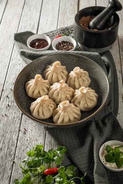 Close Caucasian Khinkali Dumplings Dish Served Plate Background Ingredients Scattered — Stock Photo, Image