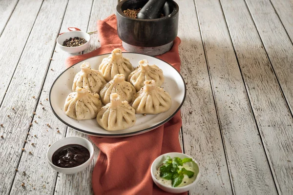 Close Caucasian Khinkali Dumplings Dish Served Plate Background Ingredients Scattered — Stock Photo, Image