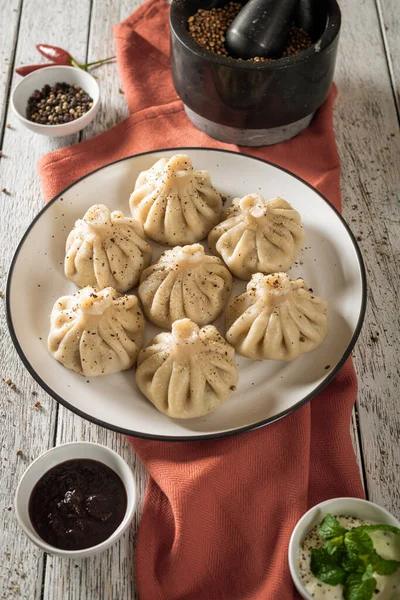 Close Caucasian Khinkali Dumplings Dish Served Plate Background Ingredients Scattered — Stockfoto