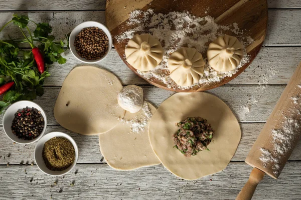 Close Caucasian Khinkali Dumplings Dish Served Plate Background Ingredients Scattered Rechtenvrije Stockfoto's