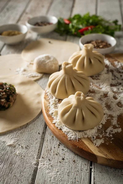 Close Caucasian Khinkali Dumplings Dish Served Plate Background Ingredients Scattered Stock Picture