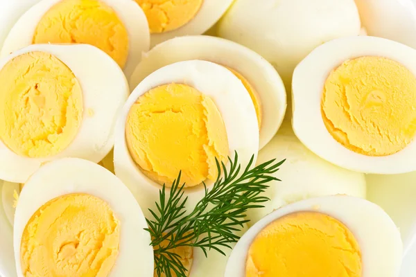 Boiled eggs with dill — Stock Photo, Image