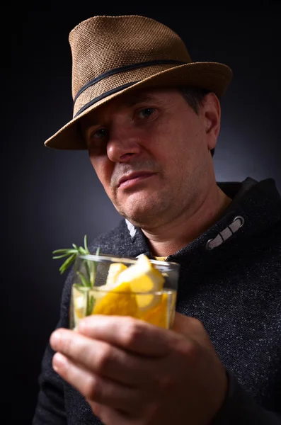 Man with glass of alcoholic drink — Stock Photo, Image
