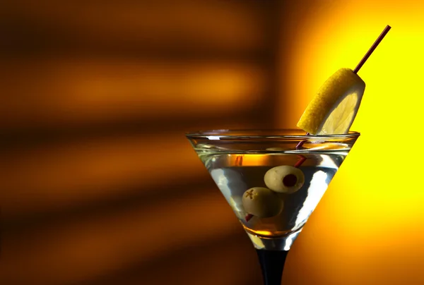 Martini with lemon and green olives — Stock Photo, Image