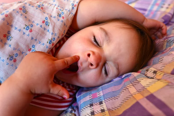Yawning sleeping girl — Stock Photo, Image