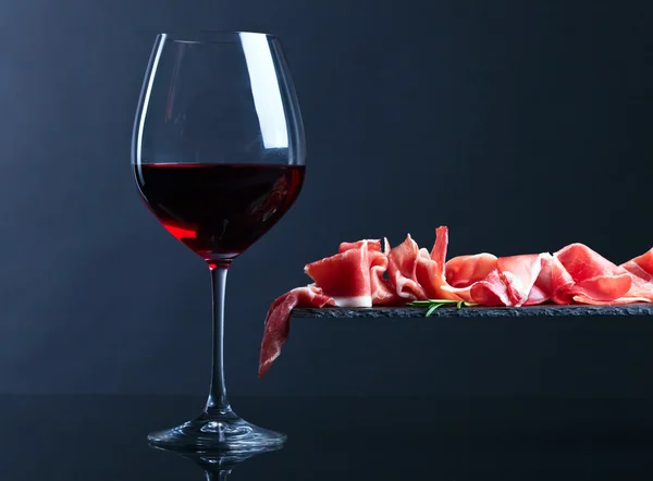Jamon with red wine and  rosemary — Stock Photo, Image