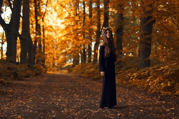 Witch in dark forest — Stock Photo, Image