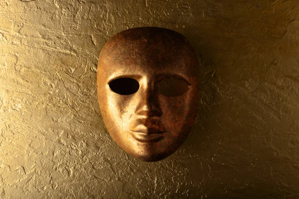 Carnival mask on a golden background — Stock Photo, Image