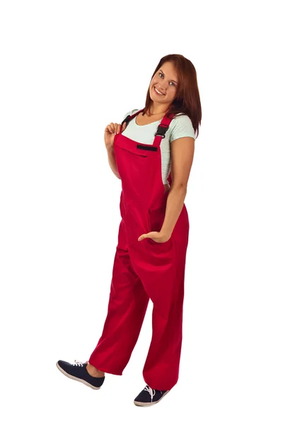 Woman in red overalls  , isolated on white — Stock Photo, Image