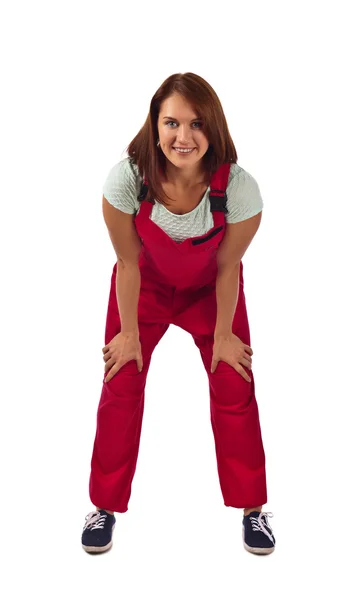 Woman in red overalls  , isolated on white — Stock Photo, Image