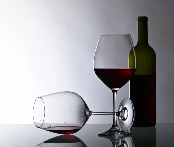 Bottle and glass of red wine — Stock Photo, Image