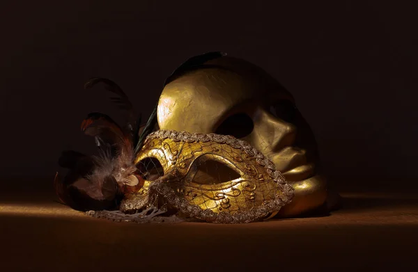 Two golden Venetian masks — Stock Photo, Image