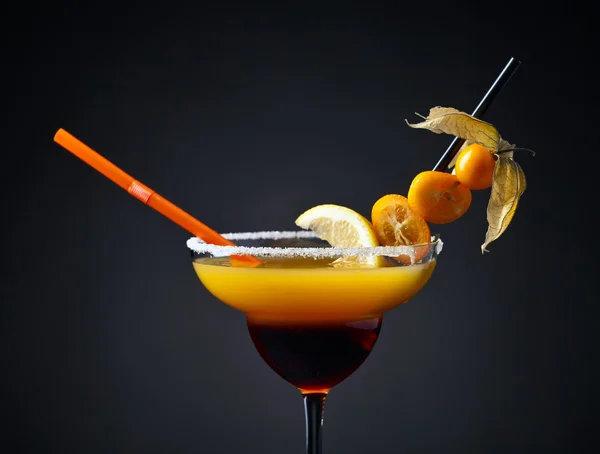 Cocktail with physalis,kumquat and lemon — Stock Photo, Image