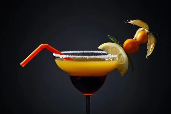 Cocktail with physalis,kumquat and lemon — Stock Photo, Image