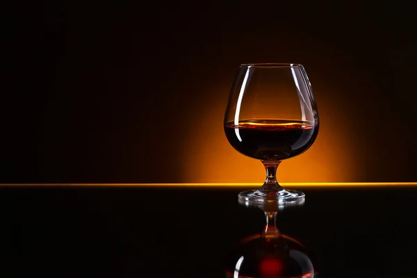 Snifter with brandy — Stock Photo, Image