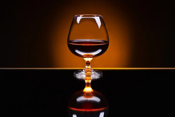 Snifter with brandy — Stock Photo, Image