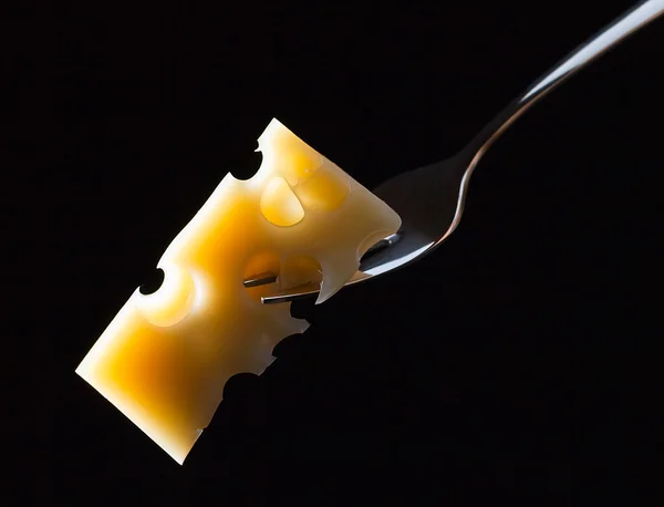 Cheese on a fork — Stock Photo, Image