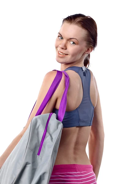 Girl with sport bag isolated on white — Stock Photo, Image