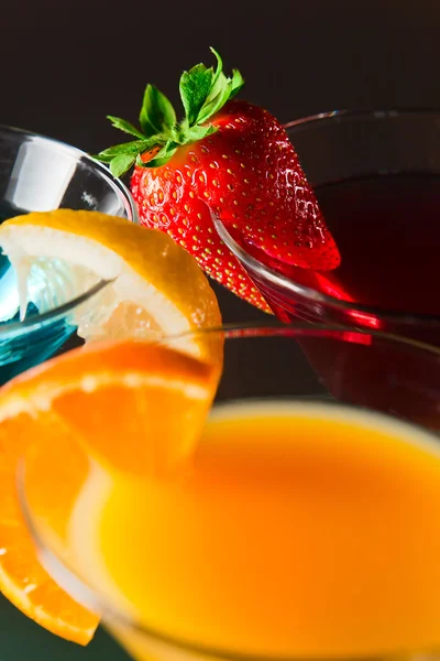 Cocktails  with strawberry, lemon and orange — Stock Photo, Image