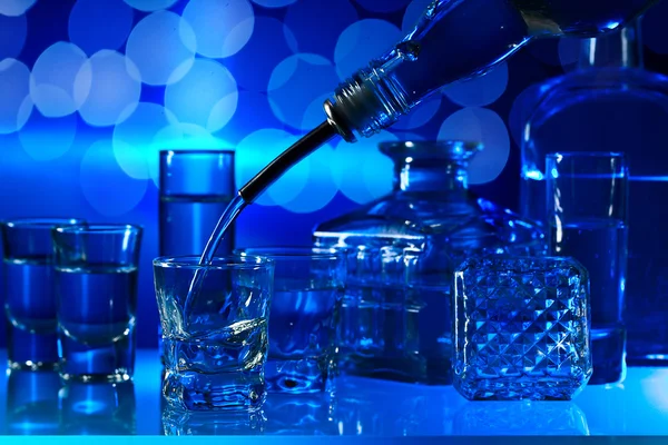 Vodka  on glass table — Stock Photo, Image