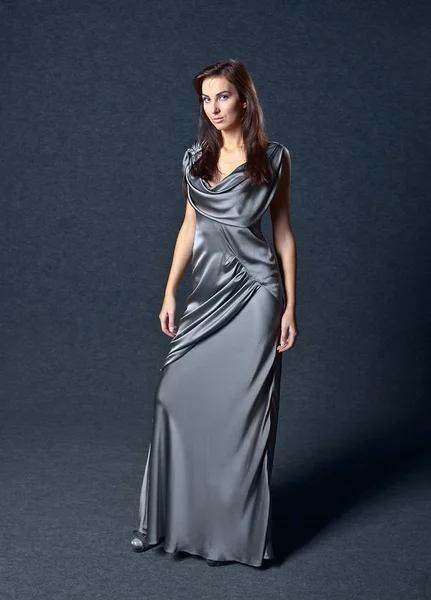 Woman in grey evening dress — Stock Photo, Image