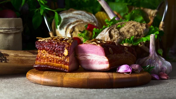 Smoked meat with garlic — Stock Photo, Image