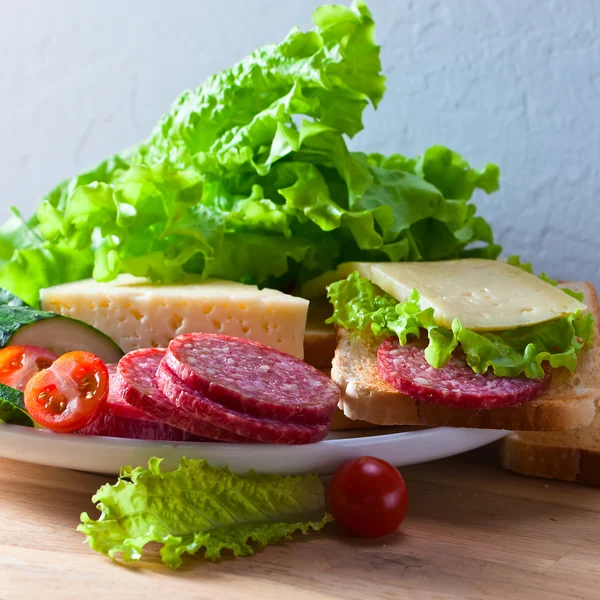 Breakfast with salami and cheese — Stock Photo, Image