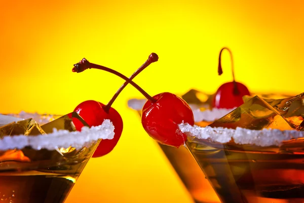 Alcoholic drink with cherries — Stock Photo, Image