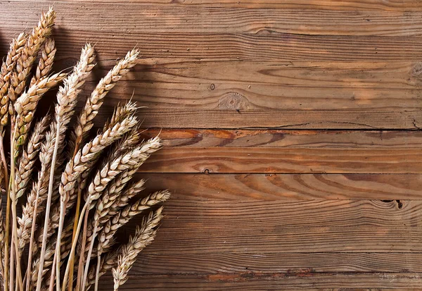 Harvest on old wooden table — Stock Photo, Image